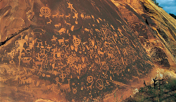 This rock art panel on the way to Indian Creek and the Needles District of Canyonlands National Park has 2000 years of history depicted in over 650 rock art designs left by the Ancestral Puebloans, Fremont people, Navajo people and Anglo-Americans.